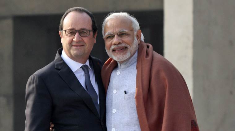 French President Francois Hollande, left, poses with Indian Prime Minister Narendra Modi, during a visit to the Capitol Complex in Chandigarh. Image Courtesy: IndianExpress