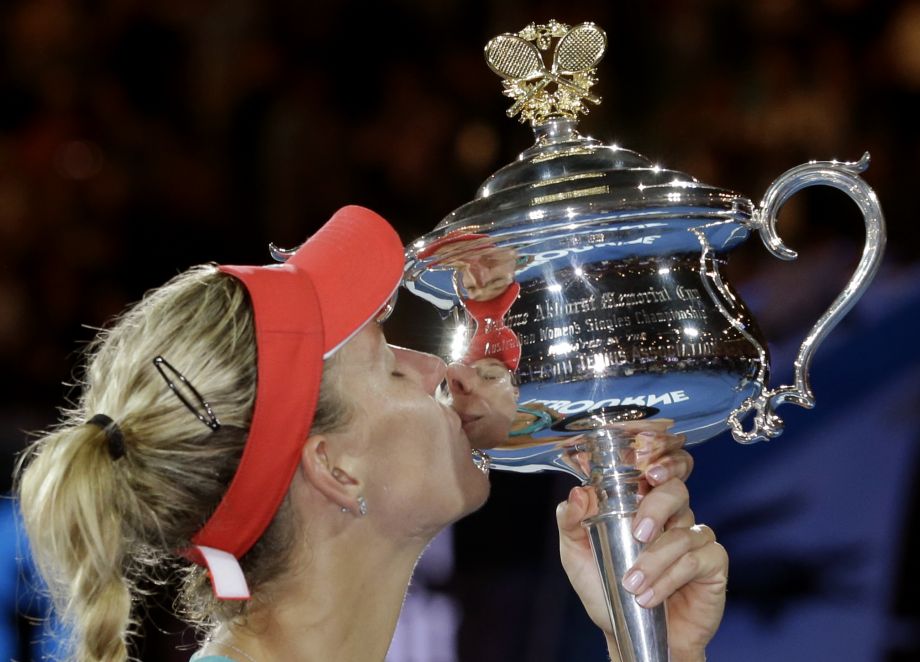 Kerber with the Australian Open Trophy. Image Courtesy: sfchronicle.com