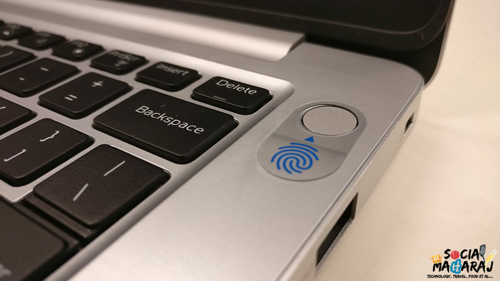 Fingerprint sensor embedded under the power button.