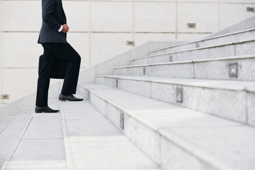 Person Climbing Steps