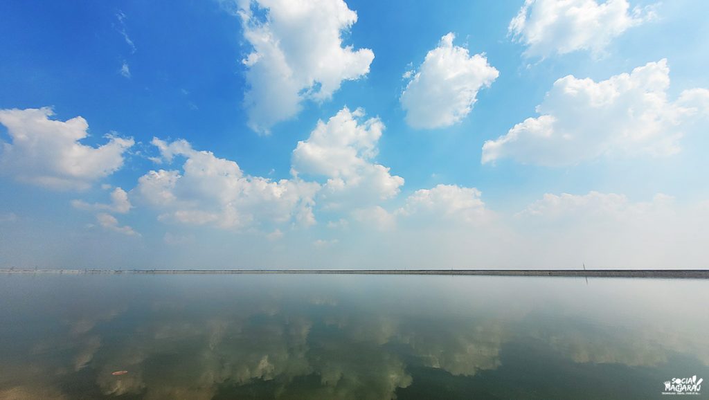 Blue sky and crystal reflection at Ranganayaka reservoir